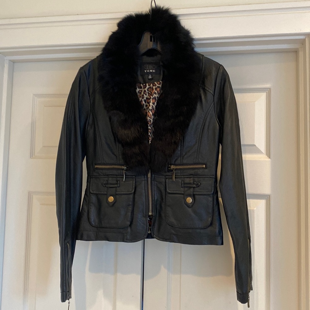 Cropped faux leather jacket with detachable fur color and fun zipper accents. S